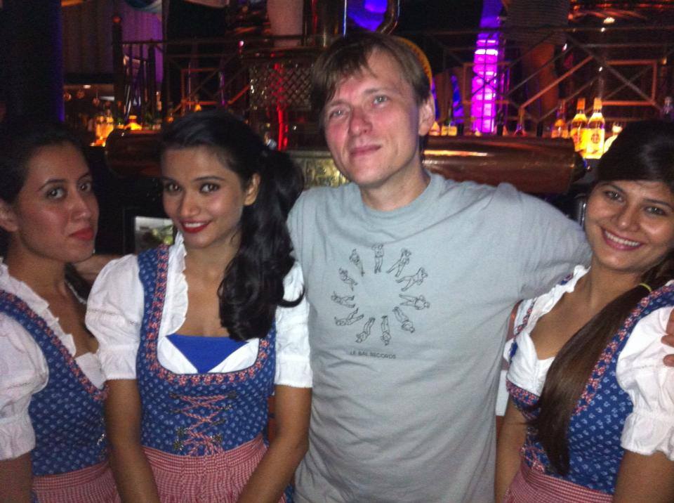 Oktoberfest in India, nice German Beer on Bavarian brewing gear. Pretzels …