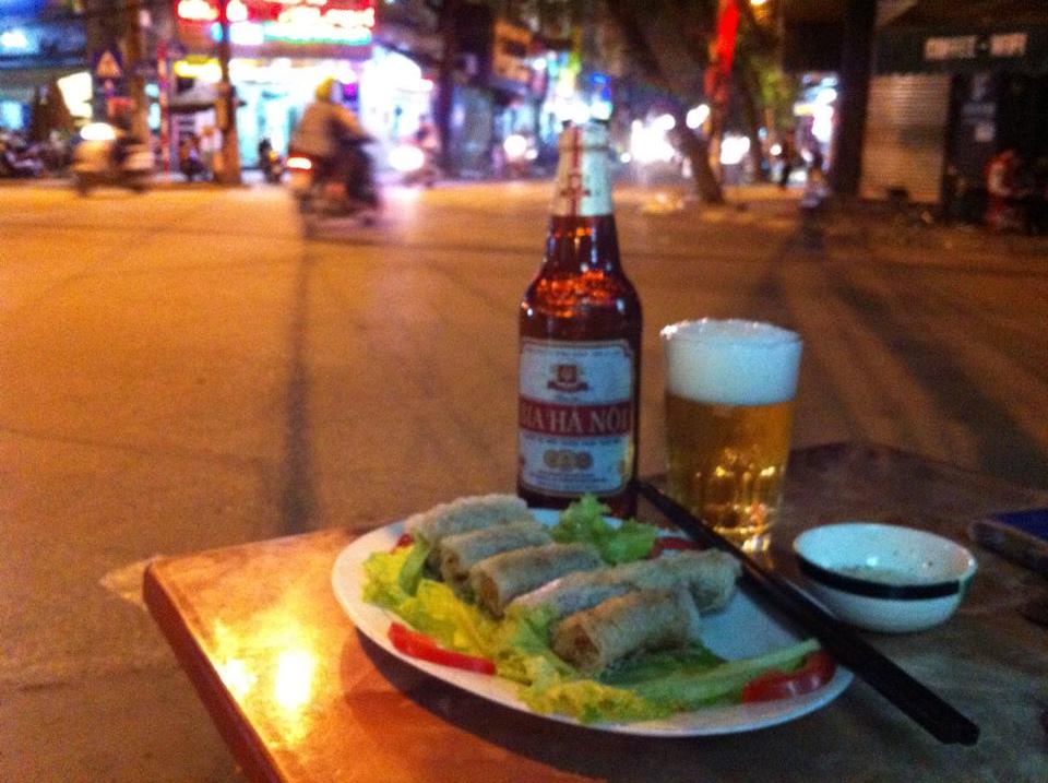 Street Corner Cafe, honking motorcycles everywhere, Bia Hà Nôi & Crab Meat …