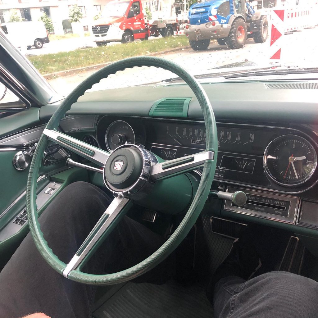 Driven by passion - and @sevencarstens black and long Cadillac Sedan de Ville …